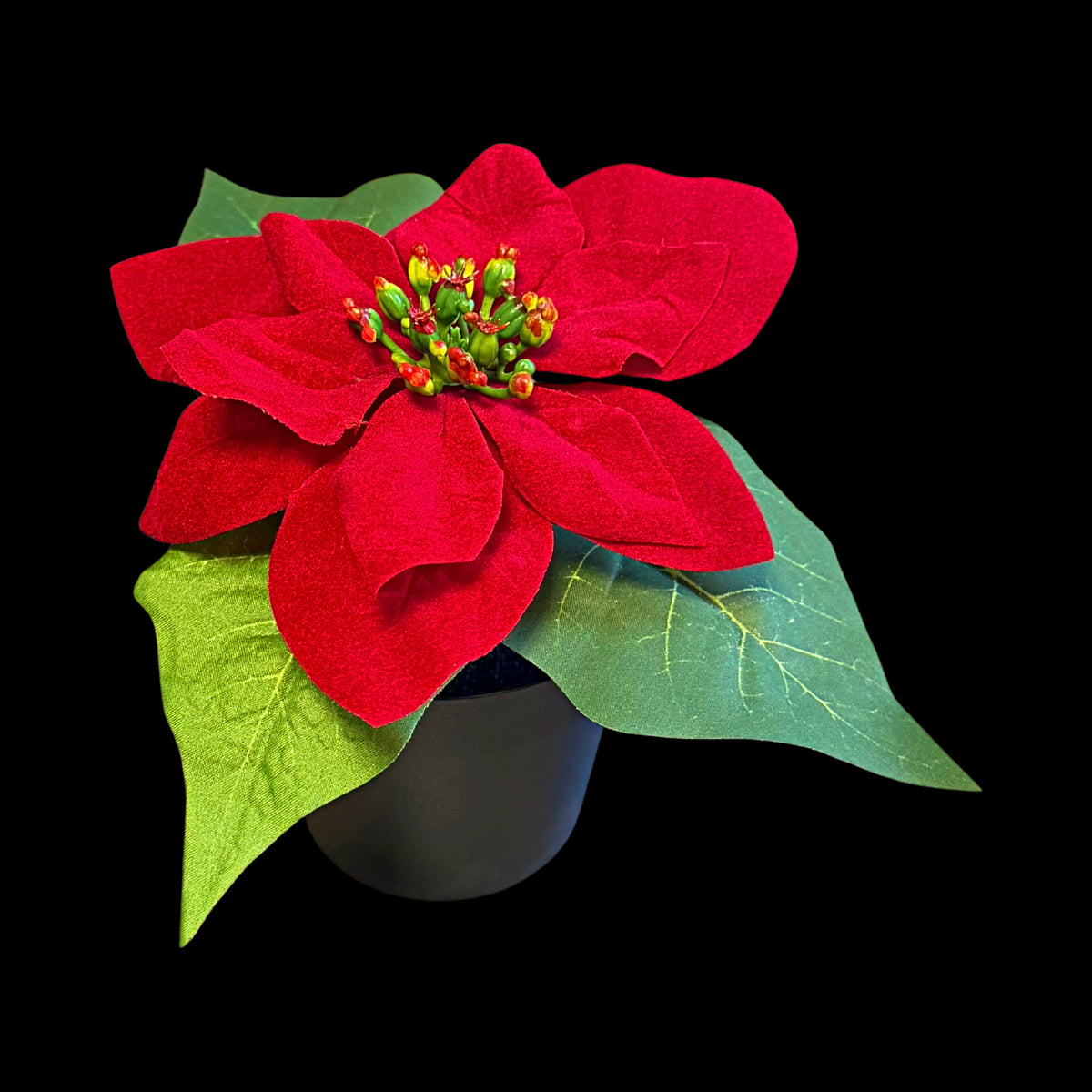Étoile de Noël artificielle rouge en pot 15 cm, fleur et feuilles vertes dans un petit pot noir